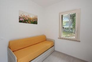 Cozy Villa with private garden close to the sea - By Beahost Rentals Apartment in Bibione