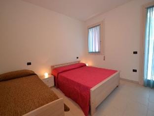 Modern apartment with balcony in Rosolina Mare by Beahost Rentals Apartment in Rosolina Mare