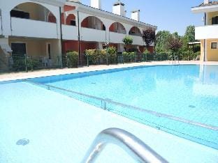 Apartment with shared pool for 5 people - By Beahost Rentals Apartment in Bibione