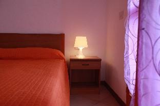 Beautiful villa with private garden and porch by Beahost Rentals Apartment in Rosolina Mare