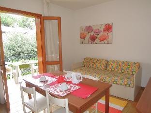 Villa with garden and barbeque 250 meters from the beach 44 - By Beahost Rentals Apartment in Bibione