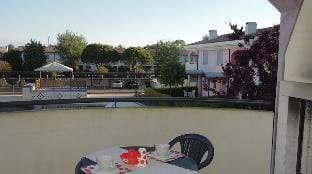 Holiday camp with swimming pool near the Thermal Baths of Bibione Apartment in Bibione