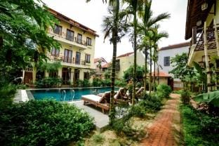 Connecting room in Upscale Orchid Riverside Oasis. Apartment in Hoi An
