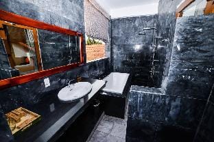Connecting room in Upscale Orchid Riverside Oasis. Apartment in Hoi An