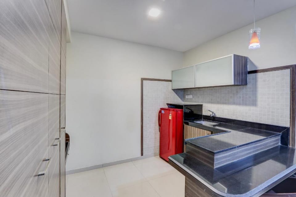 Super Townhouse Kakinada Nagamalli Thota Junction Resort in Andhra Pradesh