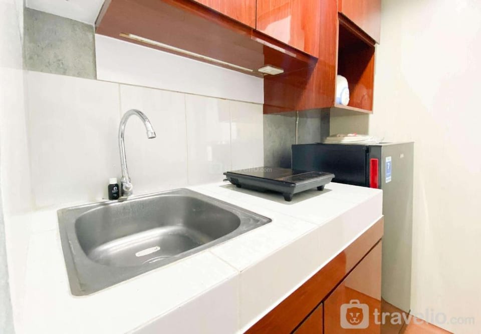 Homey Good Choice Studio Amartha View By Travelio Apartment in Indonesia