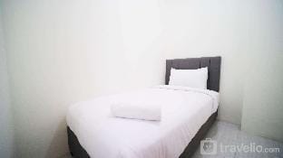 CozyLiving 2BR at Puncak Dharmahusada By Travelio Apartment in Surabaya
