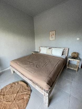 5 Minutes walk to The Beach Tyana Private Rooms Apartment in North Kuta