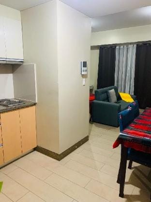 Studio 8th FL w/ Balcony across Terminal 3 Airport Apartment in Pasay