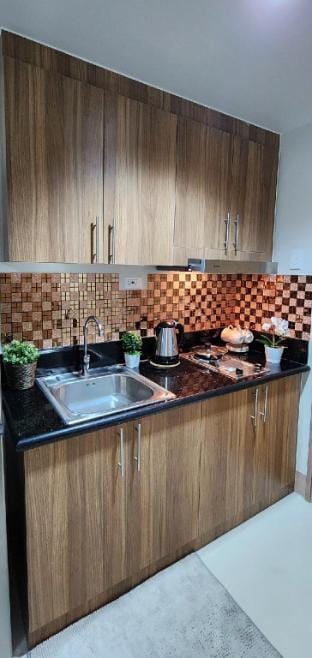 Staycation- Bedroom with balcony Apartment in Pasay