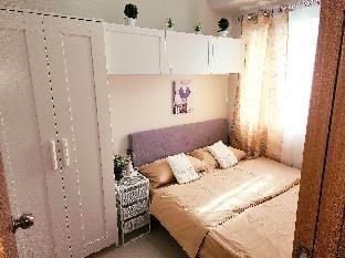Staycation- Bedroom with balcony Apartment in Pasay