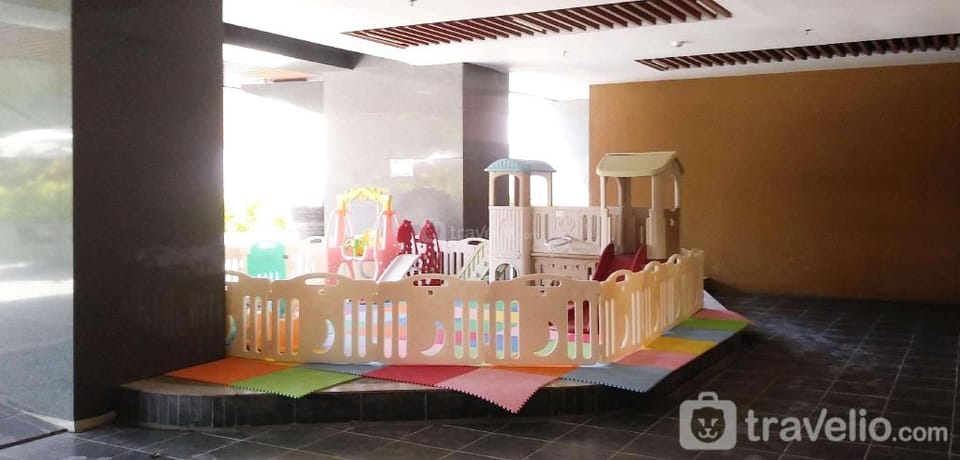 Beautiful 2BR Grand Sungkono Lagoon By Travelio Apartment in Surabaya