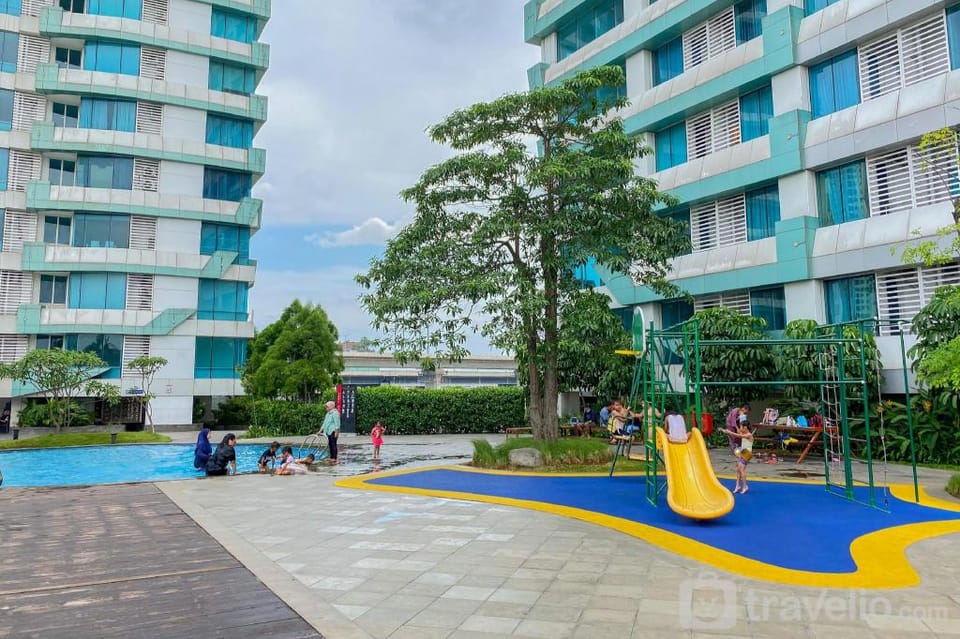 Cozy 1BR Grand Kamala Lagoon Apt By Travelio Apartment in West Java