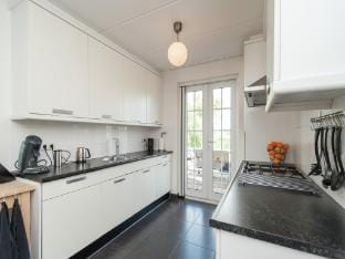 Boathouse Villa near Stavoren with view Vacation rental in Friesland, Netherlands