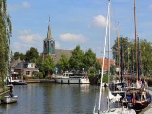 BB farm Grutsk in Suwald with private harbour Vacation rental in Leeuwarden