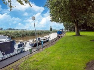 Fantastic Chalet near open waterways, hot tub Vacation rental in Flevoland, Netherlands