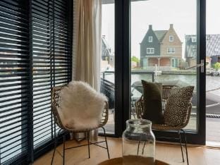 Houseboat in Stavoren with Waterfront Views Docked boat in Friesland, Netherlands