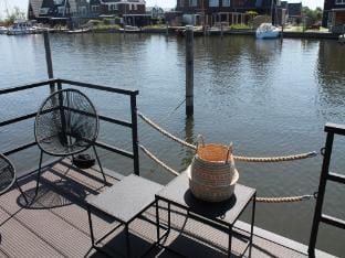 Houseboat in Stavoren with Waterfront Views Docked boat in Friesland, Netherlands