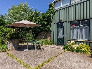 Studio in a mini-campsite near beach Vacation rental in Vrouwenpolder