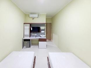 Sky In Homestay Syariah near RSUD Sogaten Mitra RedDoorz Vacation rental in East Java