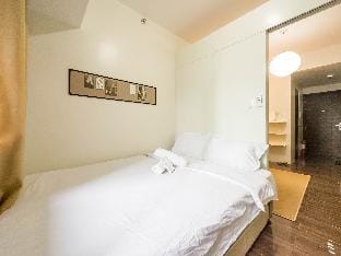 Creamy Cozy 1BR in Air Residences in Makati CBD Apartment in Makati