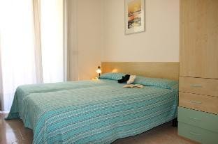 Beautiful four-roomed apartment with swimming pool and garden By Beahost Rentals Apartment in Bibione