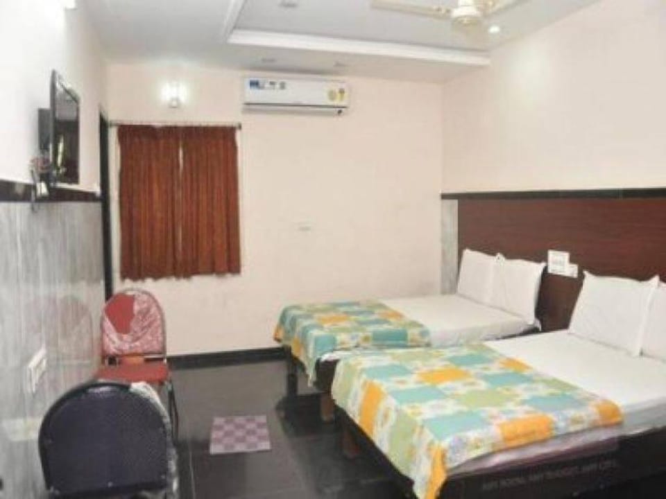 OYO Flagship Hotel Sunrise Hotel in Vijayawada