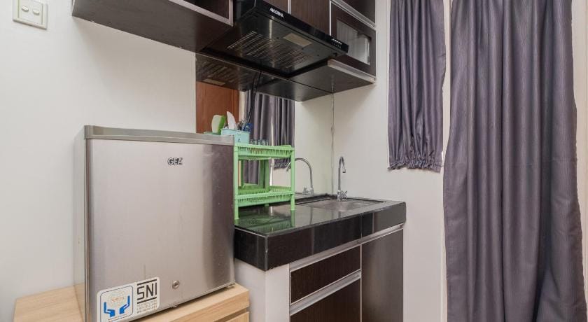 Apartemen Green Lake View Ciputat by Alfa Rooms Hotel in South Jakarta City