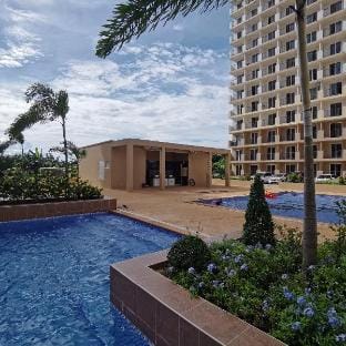 Affordable Condo with Pool, Shower Heater & Wi-Fi Apartment in Lapu-Lapu City