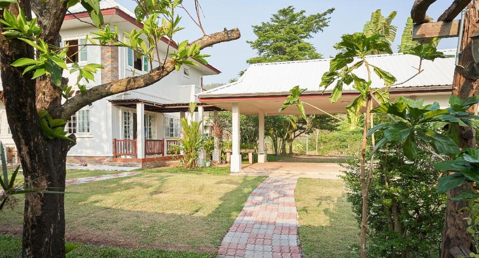 Master bedroom in the Beautiful White House Vacation rental in Laos