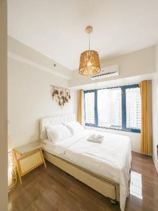 Cozy Woodland Retreat 1BR in Air Residences 2X52 Apartment in Makati