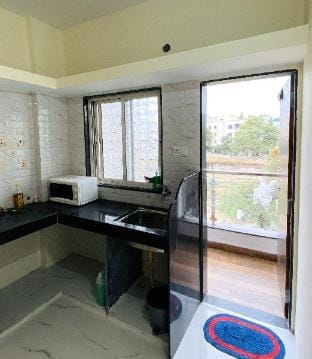 The Peacewood's Homes Apartment in Pune