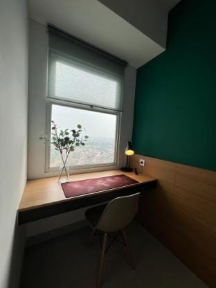 MRT Oasis. Sleek Serpong Garden Studio Apartment in West Java