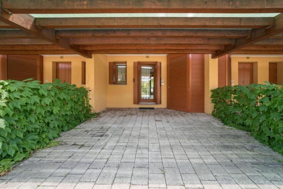 Lovely apartment with private garden by Beahost Rentals Apartment in Lignano Sabbiadoro