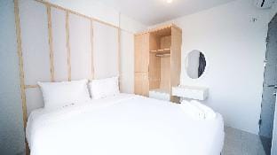 Homey and Comfy 2BR Suncity Residence By Travelio Apartment in East Java