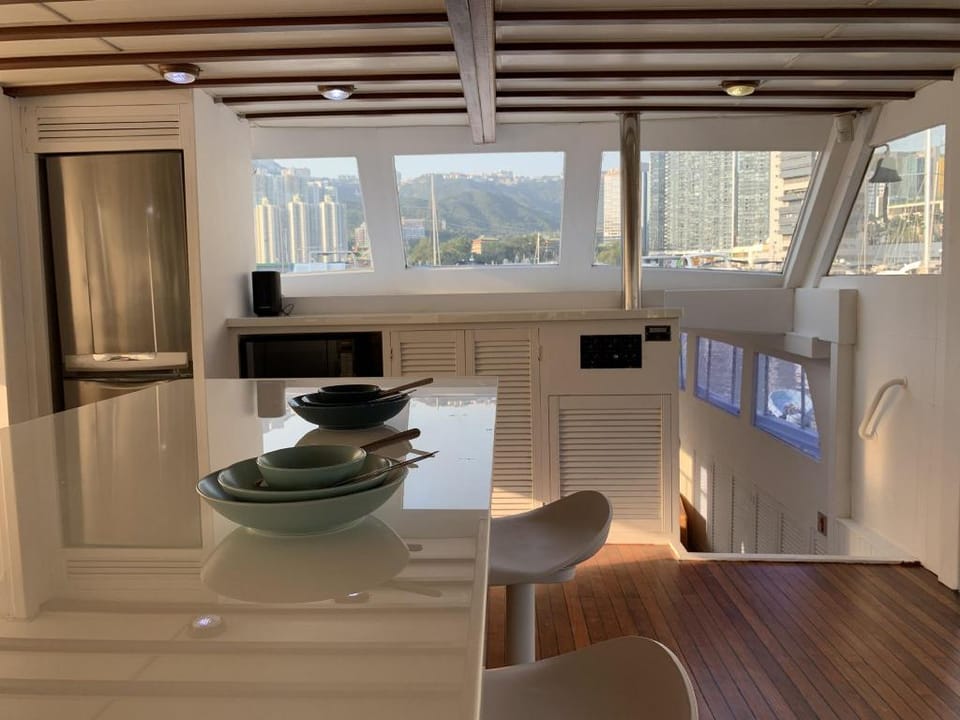 10 mins to wonderful Houseboat Docked boat in Hong Kong