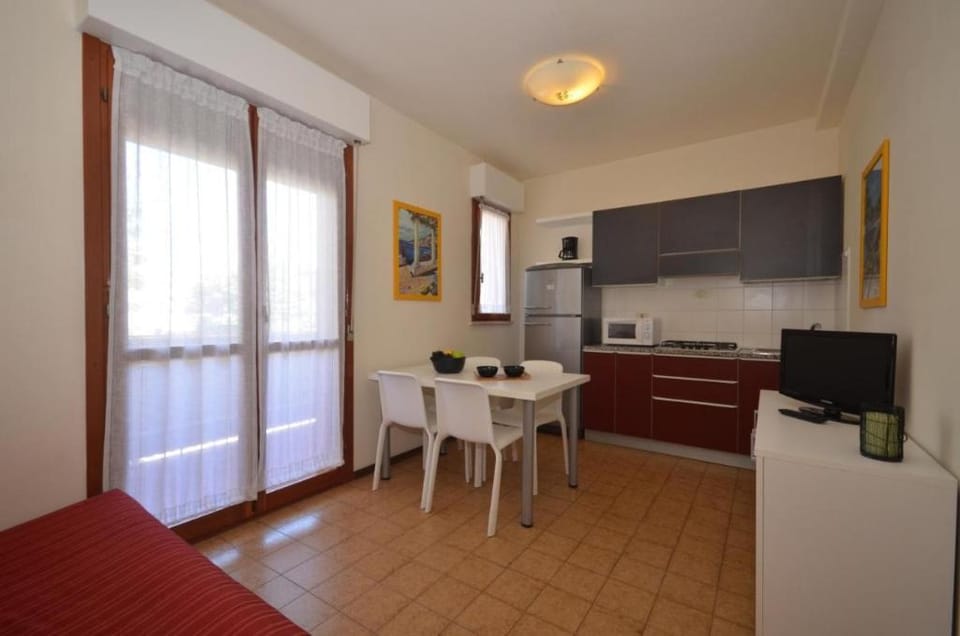 Family friendly apartment with shared outdoor pool by Beahost Rentals Apartment in Bibione