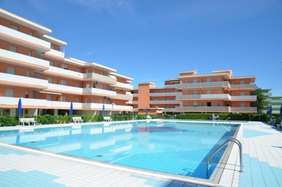 Spacious apartment for up to 6 guests with shared outdoor pool by BeahostRentals Apartment in Bibione