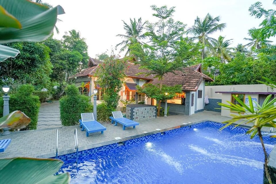 Pop Tavern Private Pool Villa by Voyehomes Vacation rental in Thiruvananthapuram