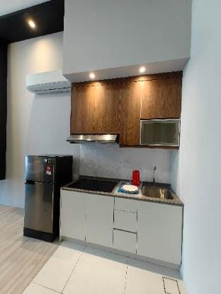 The PODIUM Kuching Studio HomeStay D322B @ 4PAX Apartment in Kuching