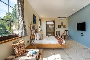 StayVista's Lawn House at Sula Wada - Vintage-Charm Cosy Home with Swimming Pool and Indoor Activiti Villa in Maharashtra