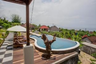 Great Deluxe Double Room Villa in Nusa Penida Vacation rental in Nusapenida