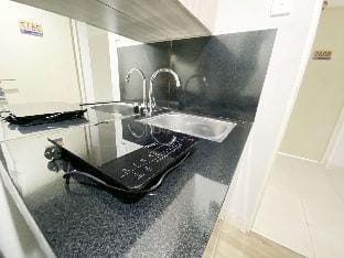 Homey Living Studio Amartha View By Travelio Apartment in Indonesia