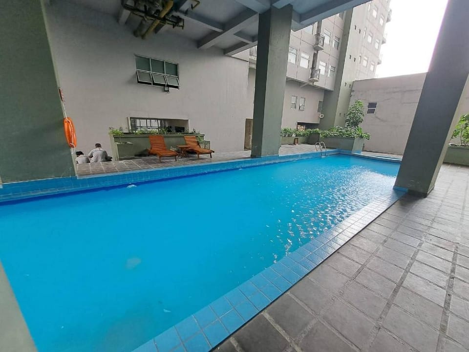 Capital O 93481 Apartement Grand Asia Afrika By Kelola Room Hotel in Bandung