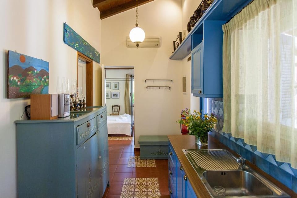 Dine on the Generous Veranda at a Rustic Stone Getaway Apartment in Crete