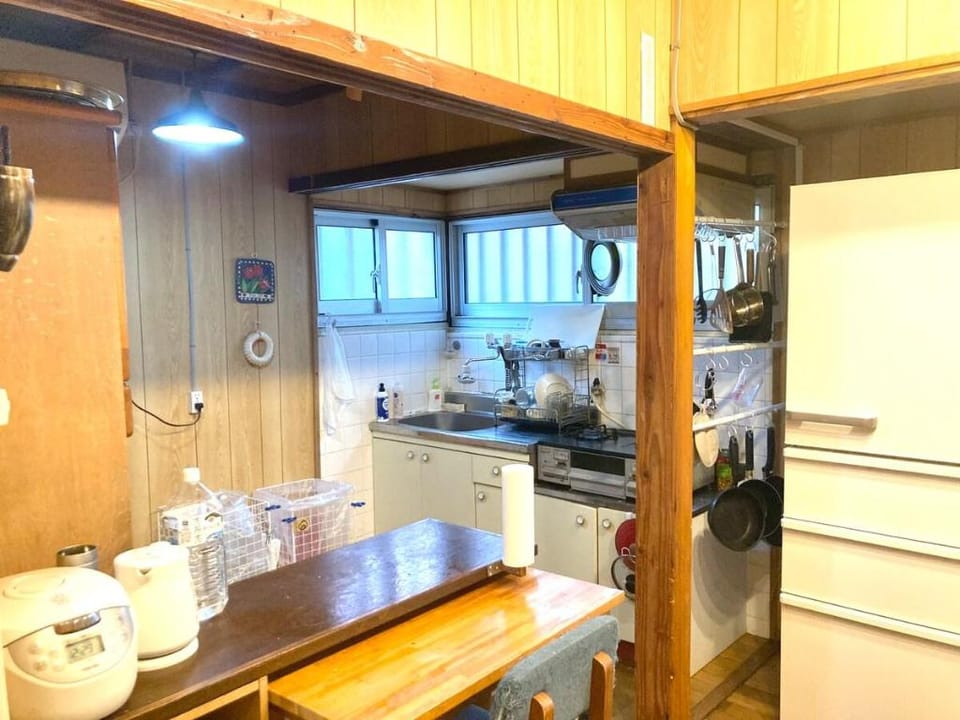3 minutes walk from Omoromachi Station! Small Guesthouse [Private Room/Futon] Vacation rental in Naha