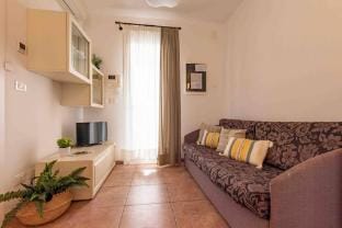 Nice and cozy three bedroom apartment close to the sea by Beahost Rentals Apartment in Bibione