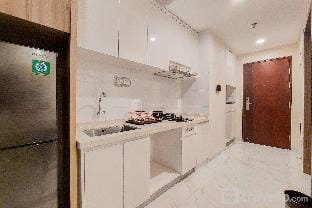 Homey 2BR at Sky House BSD By Travelio Apartment in West Java