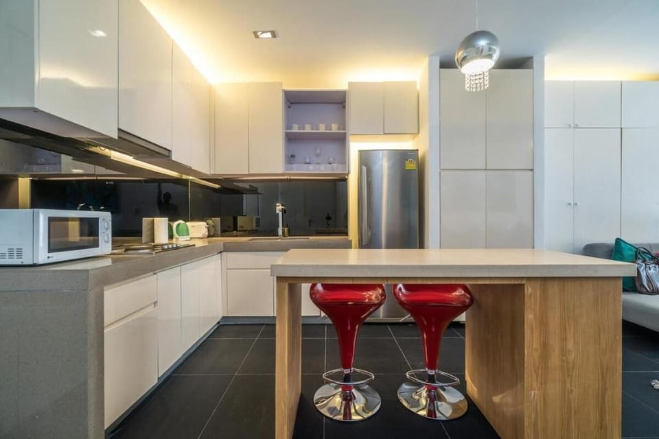 Bright apartment with forest views at Zen Space Apartment in Kamala