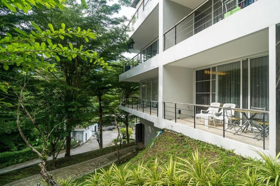 Bright apartment with forest views at Zen Space Apartment in Kamala